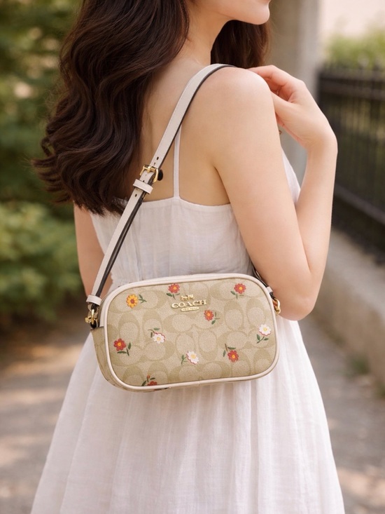Coach Handbags - COACH Beige Signature Floral Camera Crossbody